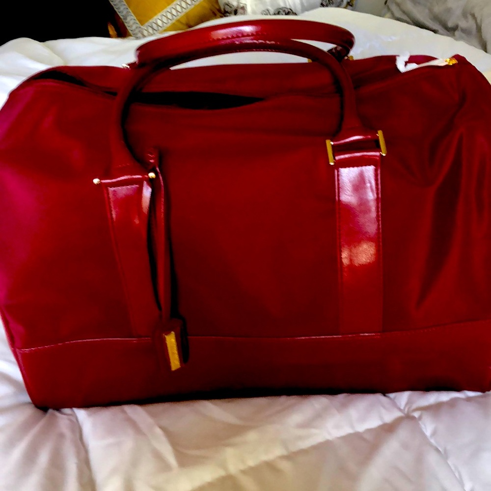 Deep burgundy red Estee Lauder tote
